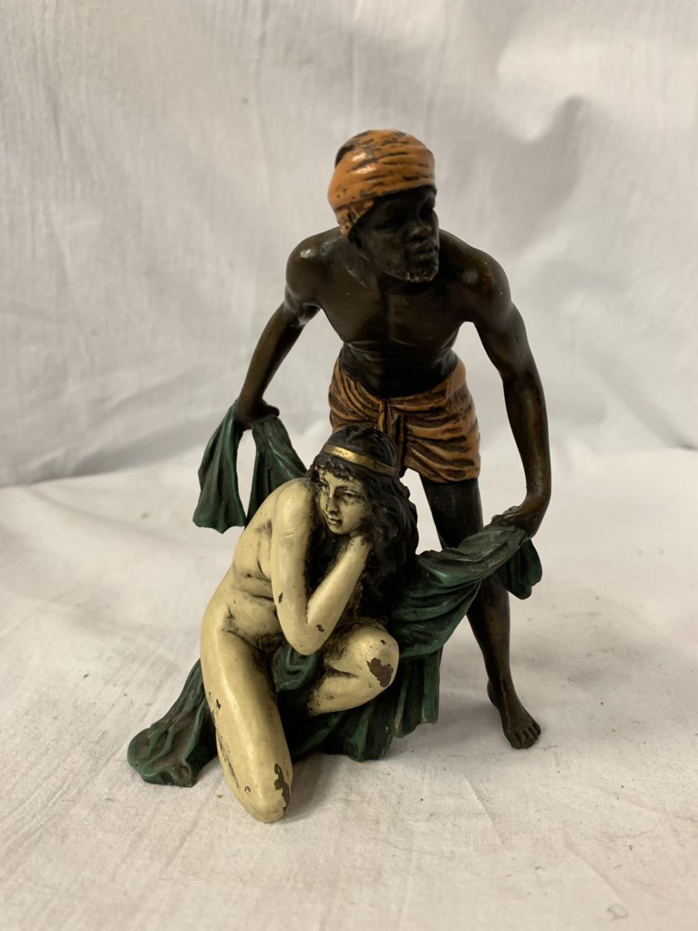 A BERGMAN STYLE COLD PAINTED BRONZE OF A NATIVE AND A GIRL HEIGHT APPROXIMATELY 12.5CM