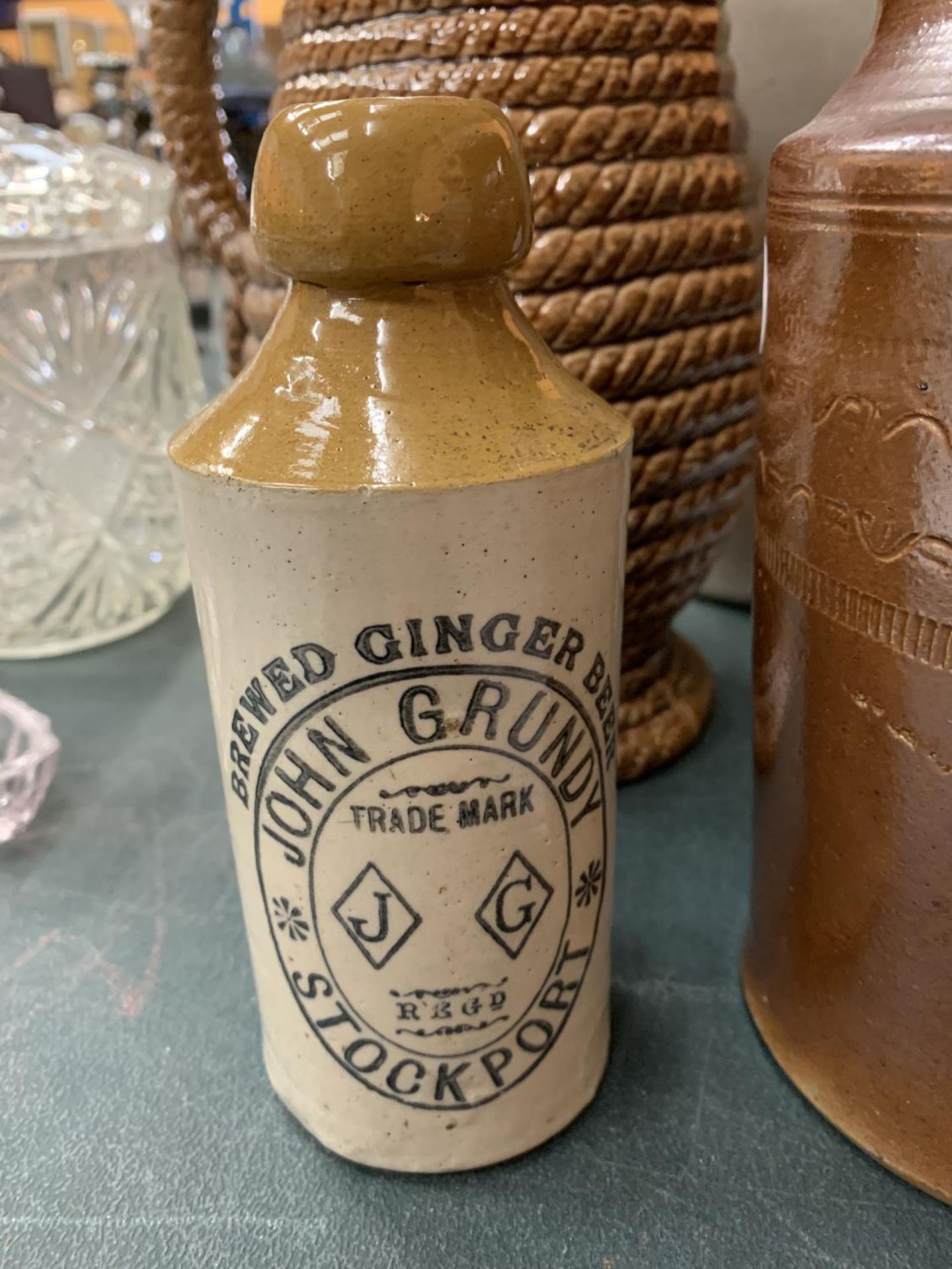 A LARGE EARTHENWARE FLAGON, A GOVENCROFT OF GLASGOW JUG WITH ROPE DESIGN, A GLAZED VINTAGE POT AND - Image 2 of 3