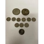 TWELVE 1921 - 1946 SILVER COINS TO INCLUDE TWO FLORINS, A SIXPENCE, AND NINE THREE PENNIES