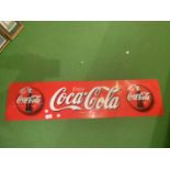 AN ENJOY COCA COLA SIGN