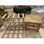 A WINE RACK AND A SMALL BAMBOO TABLE