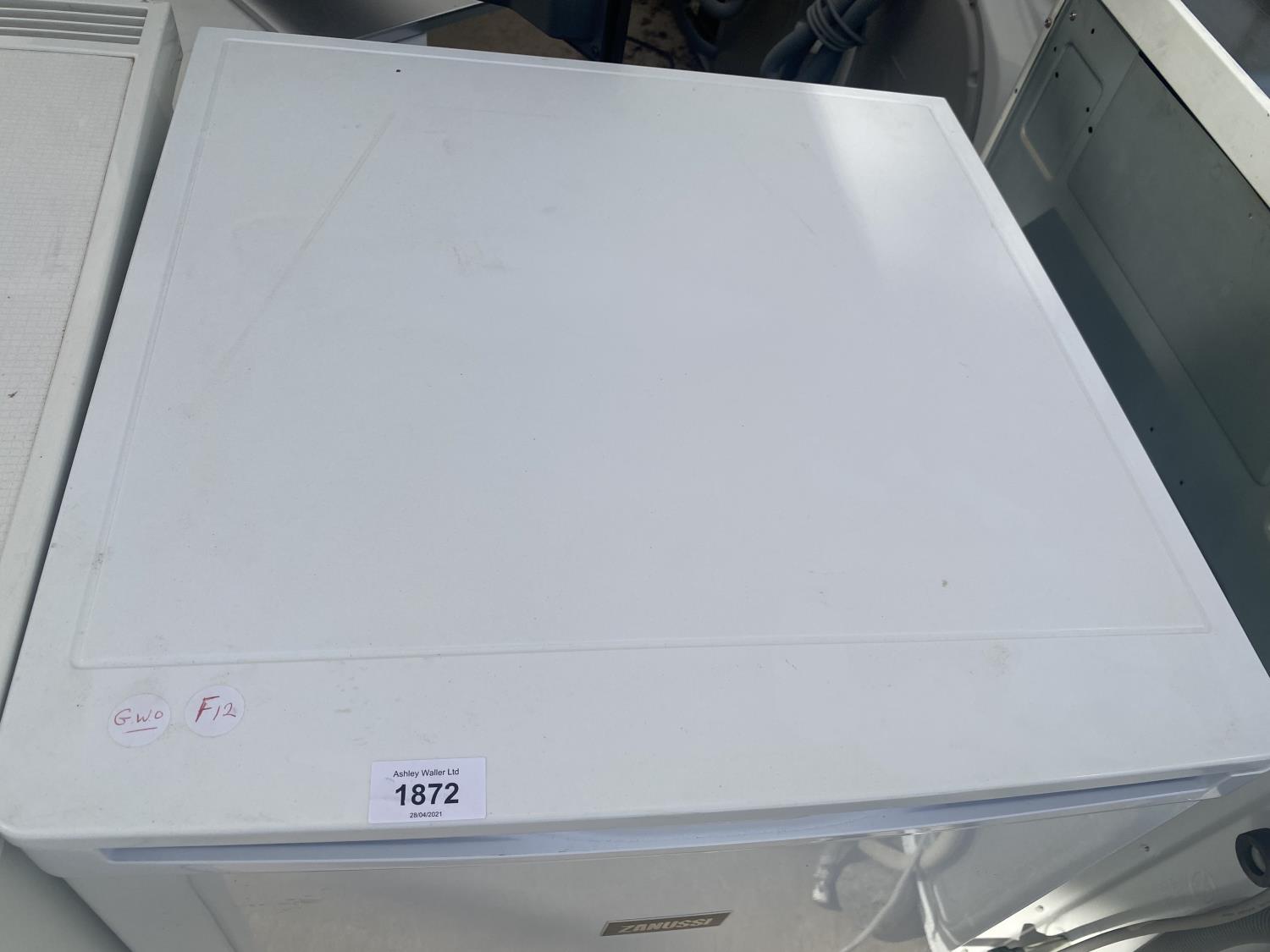 A WHITE ZANUSSI UNDER COUNTER FRIDGE BELIEVED IN WORKING ORDER BUT NO WARRANTY - Image 2 of 3