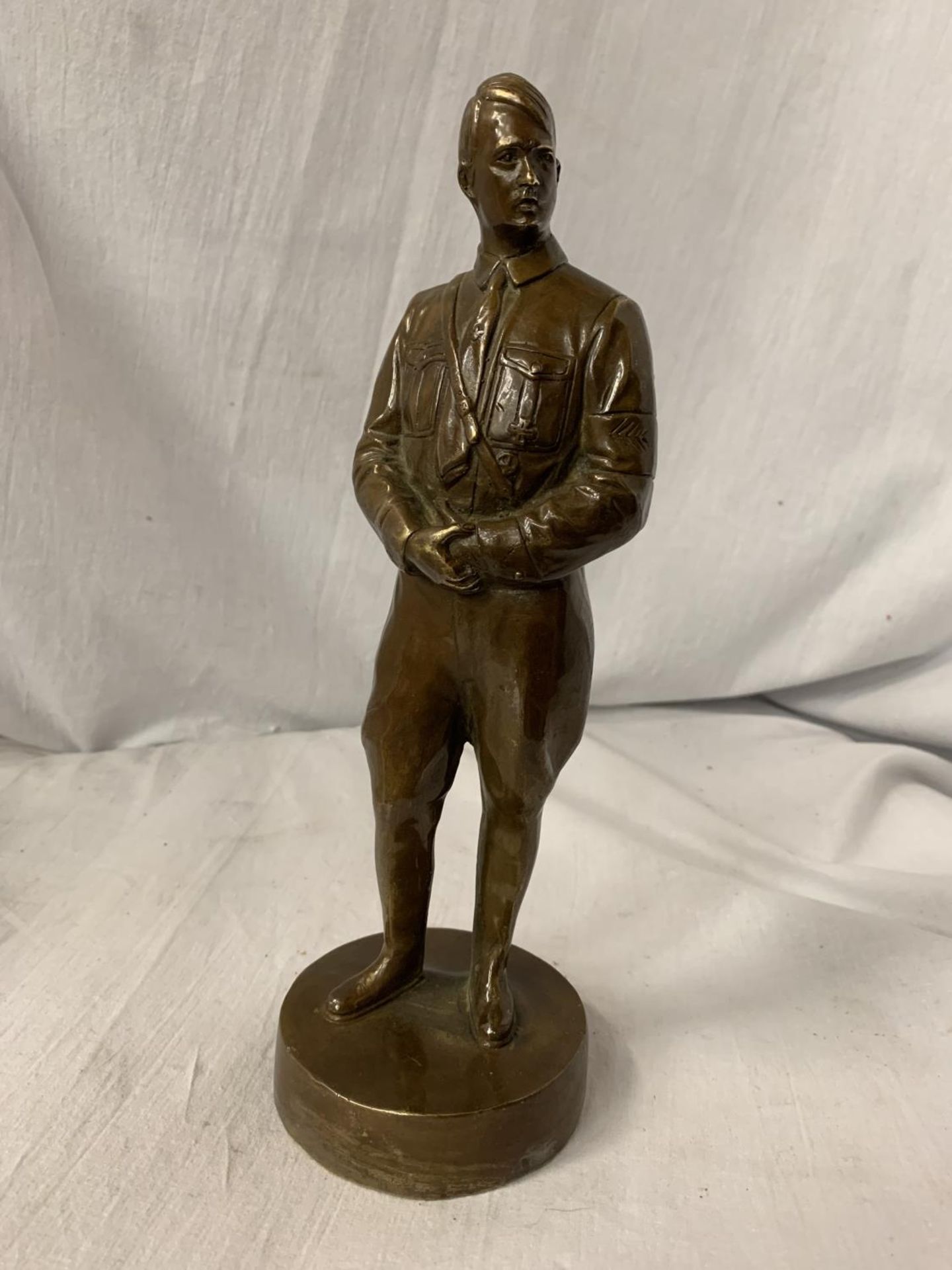 A BRONZE FIGURE IN THE FORM OF ADOLF HITLER H: 27CM