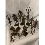 A GROUP OF TEN BRONZE FIGURINES IN THE ABSTRACT FORM