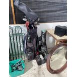 A HILL BILLY GOLF BAG WITH A QUANTITY OF GOLF CLUBS