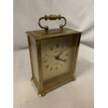 A QUARTZ PRESIDENT BRASS CARRIAGE CLOCK WITH INSCRIPTION ON THE BACK