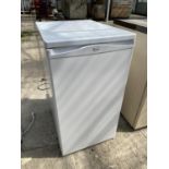 A WHITE WHIRLPOOL UNDER COUNTER FRIDGE BELIEVED IN WORKING ORDER BUT NO WARRANTY