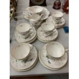 A COALPORT 'PARADISE' TEA SET TO INCLUDE FIVE TRIOS, A CREAMER, SUGAR BOWL AND PLATE