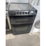 A BLACK CANNON DUEL FUEL COOKER, FUNCTION TEST, PAT TEST AND SANITIZED BUT NO WARRANTY GIVEN