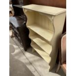 A SET OF CREAM PAINTED OPEN THREE TIER DISPLAY SHELVES, 28" WIDE