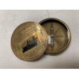 A BRASS COMPASS WITH ENGRAVING RELATING TO THE TITANIC