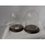A PAIR OF DOMED GLASS DISPLAY CASES H: 25CM