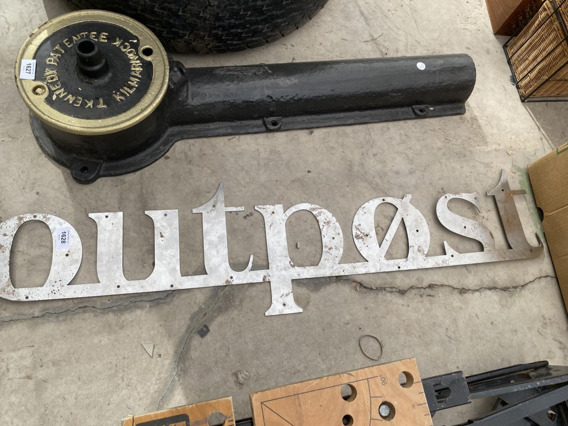 A LARGE METAL 'OUTPOST' SIGN
