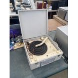 A VINTAGE RECORD PLAYER IN CASE