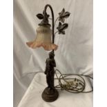 A COMPOSITE TABLE LAMP IN THE FORM OF A GRECIAN STYLE LADY WITH PINK TINGED FLUTED SHADE
