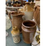 A LARGE EARTHENWARE FLAGON, A GOVENCROFT OF GLASGOW JUG WITH ROPE DESIGN, A GLAZED VINTAGE POT AND