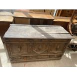 A GEORGE III OAK BLANKET CHEST WITH THREE PANEL FRONT BEARING INITIALS S.W AND DRAWER TO BASE, 50"