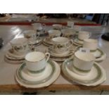 SIX ROYAL DOULTON 'RONDELAY' TRIOS AND FIVE ROYAL DOULTON 'LARCHMONT' TRIOS TO INCLUDE A CREAMER AND
