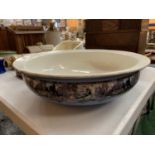 A LARGE PALE BLUE GLAZED WITH ORIENTAL STYLE DECORATION WILTON CHINA WASHING BOWL DIA: 41CM