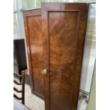 A VICTORIAN WALNUT END SECTION OF A WARDROBE (I.E. NO CORNICE, BASE OR POSSIBLY CENTRE SECTION) WITH