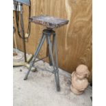 A VINTAGE STYLE ADJUSTABLE HEIGHT TRIPOD TABLE