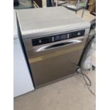 A SILVER HOTPOINT DISH WASHER BELIEVED IN WORKING ORDER BUT NO WARRANTY