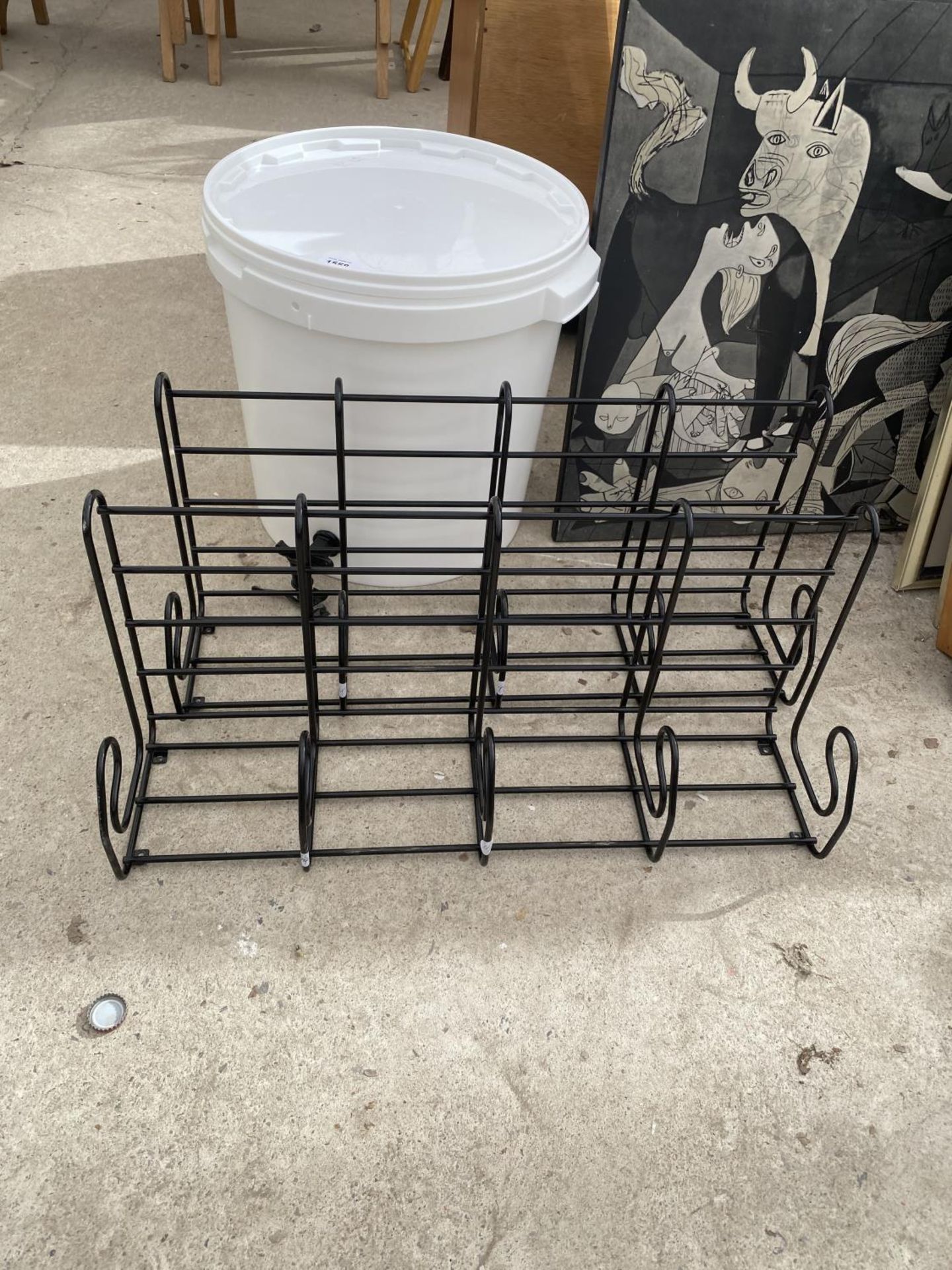 A PLASTIC WATER BUTT AND TWO METAL COAT RACKS