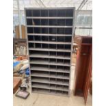 A VINTAGE 58 SECTION PIGEON HOLE STORAGE RACKING