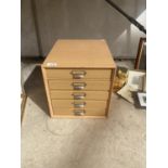 A MODERN SMALL WOODEN FIVE DRAWER FILING CABINET