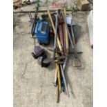 AN ASSORTMENT OF TOOLS TO INCLUDE SPADES, BRUSHES AND A MITRE SAW ETC