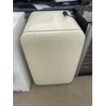 A CREAM UNDER COUNTER FRIDGE BELIEVED IN WORKING ORDER BUT NO WARRANTY