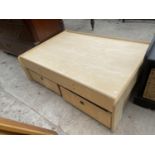 A "PLAN TOYS" BED BASE WITH TWO DRAWERS ON CASTERS 48" X 32"