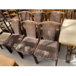 A SET OF SIX RETRO MID 20TH CENTURY BEECH DINING CHAIRS WITH UPHOLSTERED SEATS AND BACKS