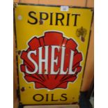 AN ENAMEL SHELL 'SPIRIT OILS' SIGN