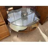 A RETRO 1970'S CIRCULAR TWO TIER COFFEE TABLE WITH SMOKED GLASS TOP, 34" DIAMETER