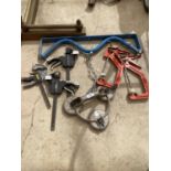 AN ASSORTMENT OF ITEMS TO INCLUDE G CLAMPS, A METAL WALL RACK AND A WINDOW GRIPPER