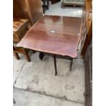 AN EDWARDIAN MAHOGANY AND INLAID SUTHERLAND TABLE