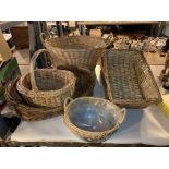 SIX WICKER BASKETS TO INCLUDE A SMALL DOG BED AND A WASHING BASKET