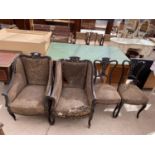 A PAIR OF EBONISED VICTORIAN FIRESIDE CHAIRS AND A PAIR OF MATCHING DINING CHAIRS