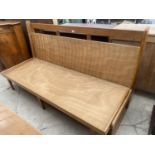 A MODERN FOLD OVER BED/SETTEE