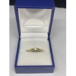 AN 18 CARAT GOLD DIAMOND SOLITAIRE RING