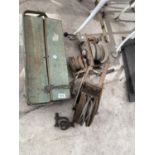 A VINTAGE METAL TOOL BOX AND THREE WINCHES