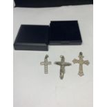 THREE SILVER CROSSES IN A PRESENTATION BOX