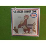 A TIN METAL 'PUT A TIGER IN YOUR TANK' SIGN 30.5CM X 30.5CM