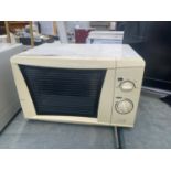 A WHITE MICROWAVE OVEN