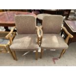 A PAIR OF MID 20TH CENTURY ELBOW CHAIRS