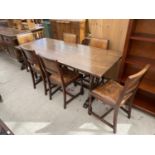 A REPRODUCTION REFECTORY STYLE DINNER TABLE 72" X 29.5" TO INCLUDE SIX CHAIRS WITH STUDDED LEATHER