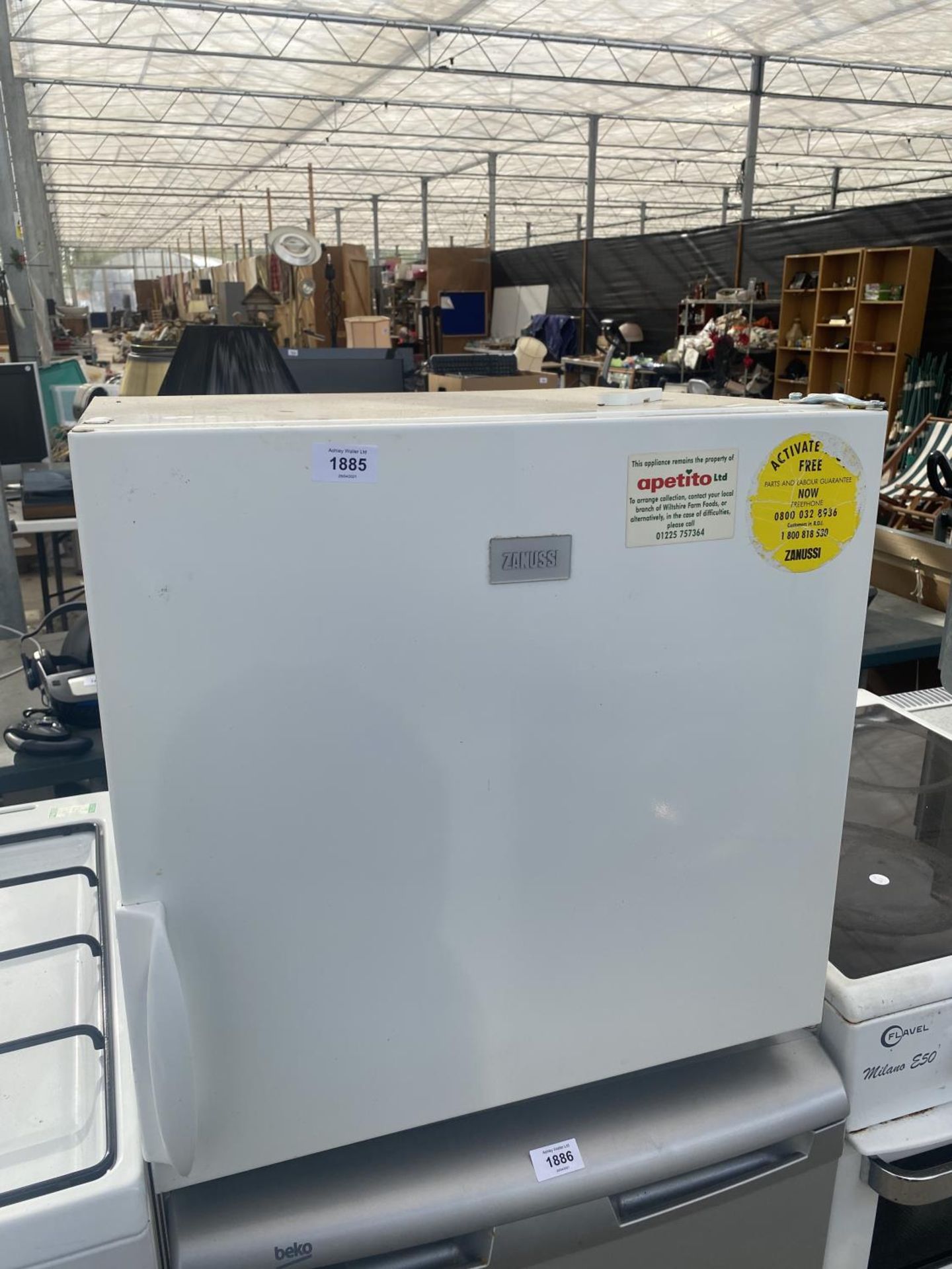 A WHITE ZANUSSI COUNTER TOP FRIDGE BELIEVED IN WORKING ORDER BUT NO WARRANTY