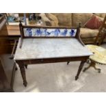 A VICTORIAN MARBLE TOPPED WASH STAND WITH TILED BACK 47" WIDE