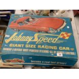 A VINTAGE TOPPER TOYS JOHNNY SPEED E-TYPE JAGUAR MODEL CAR TO INCLUDE THE ORIGINAL DRIVER AND BOX